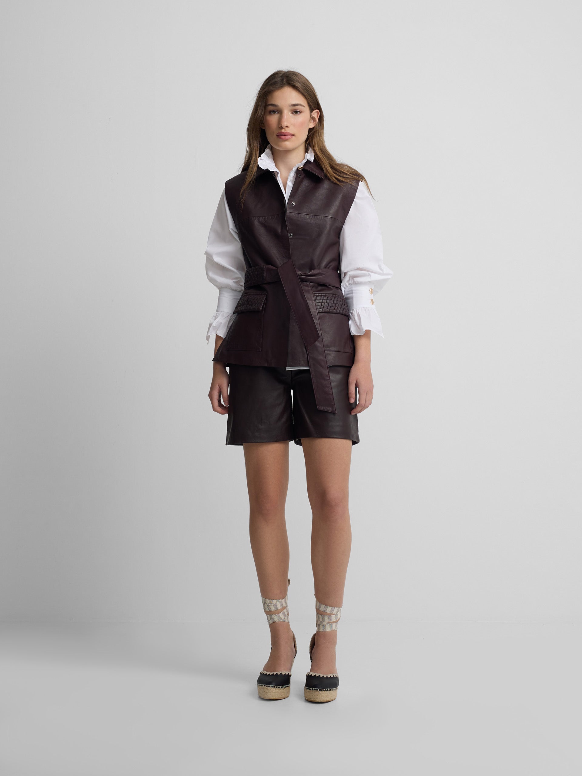 Braided burgundy leather vest