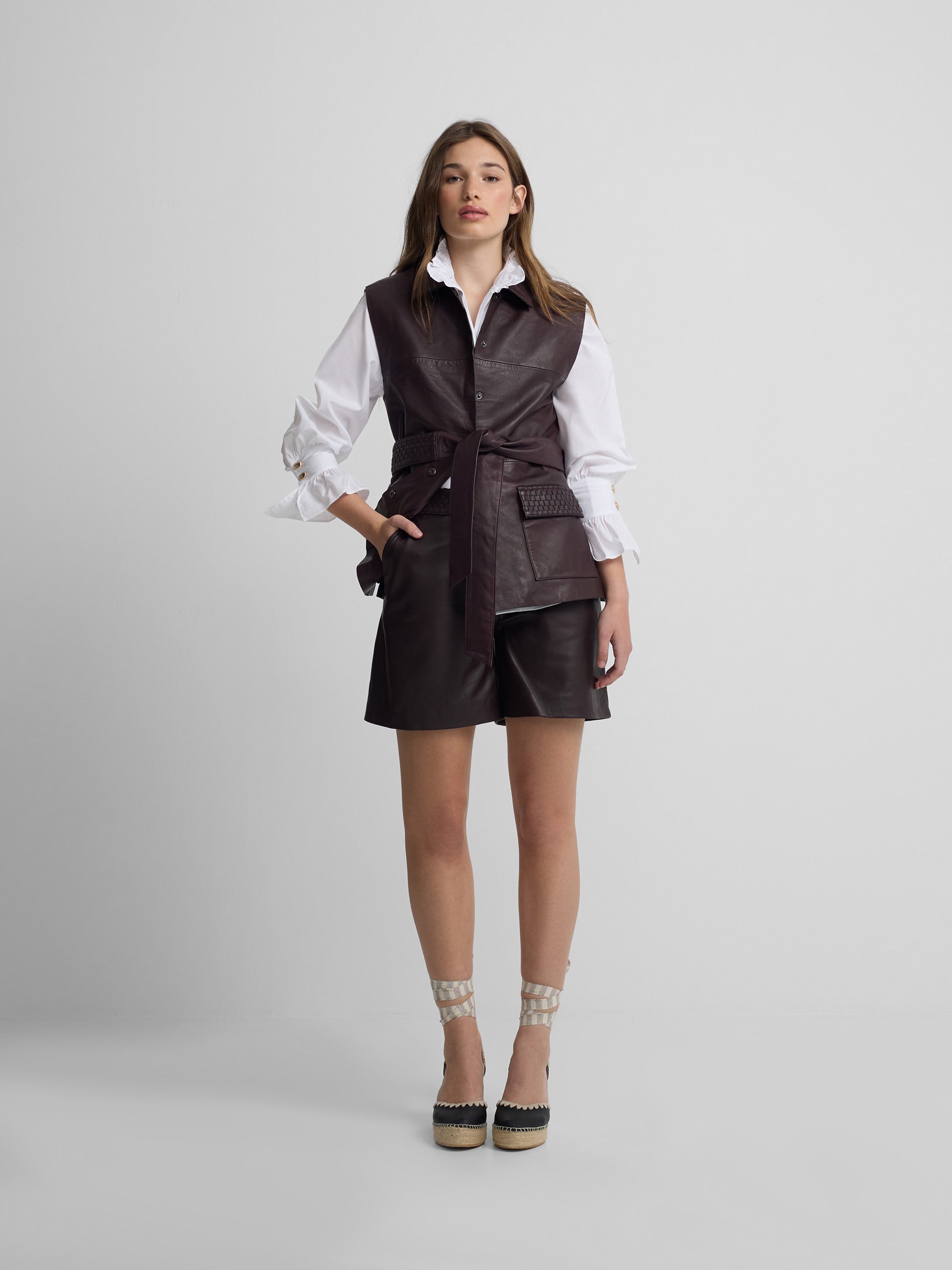 Braided burgundy leather vest