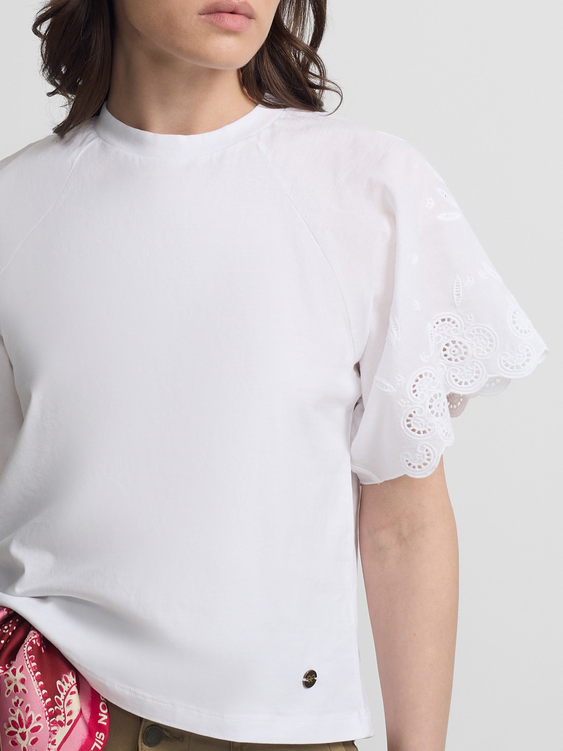 White women's t-shirt with embroidered ruffles