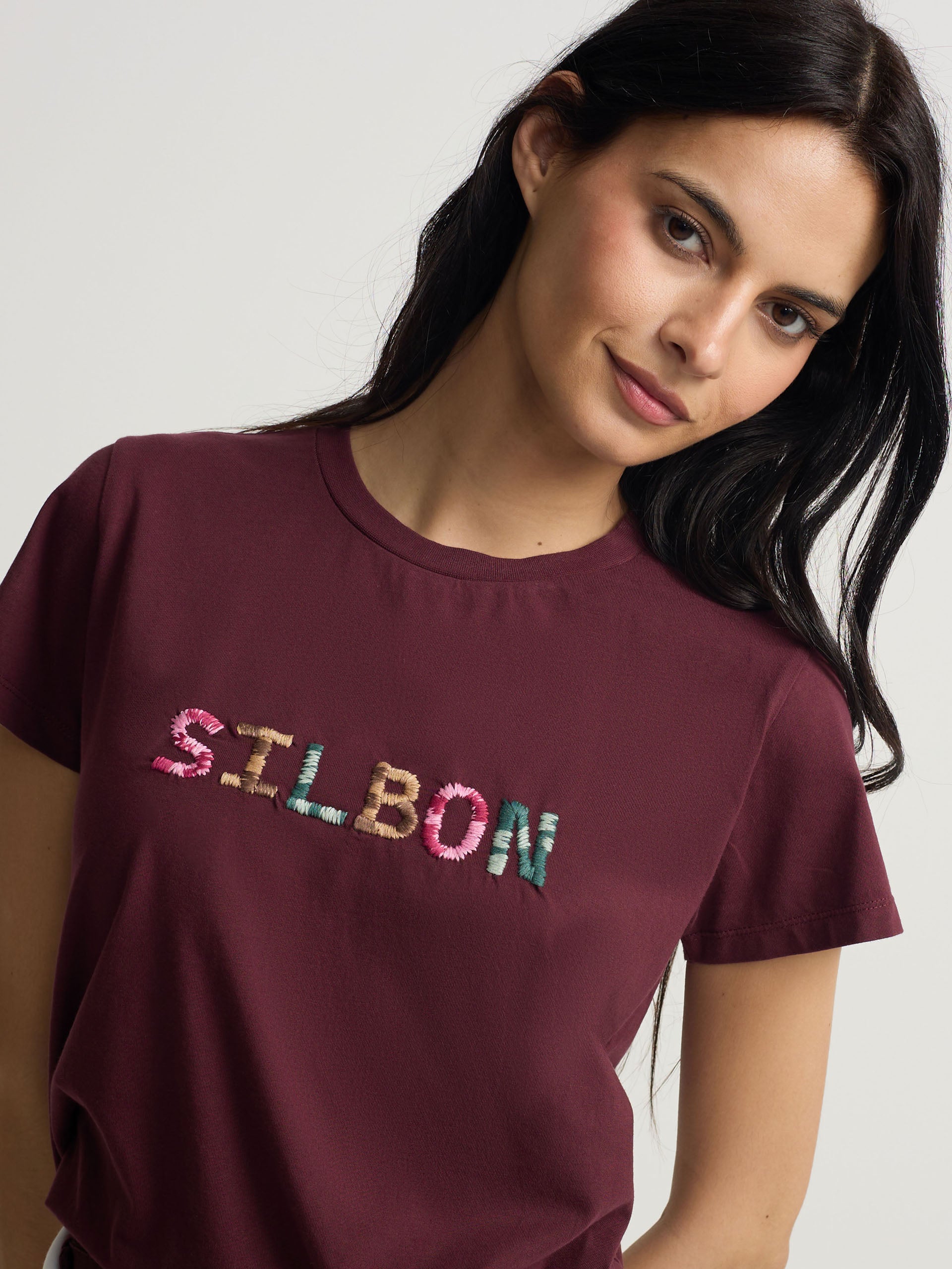 Camiseta mulher silbon rabiscada roxa