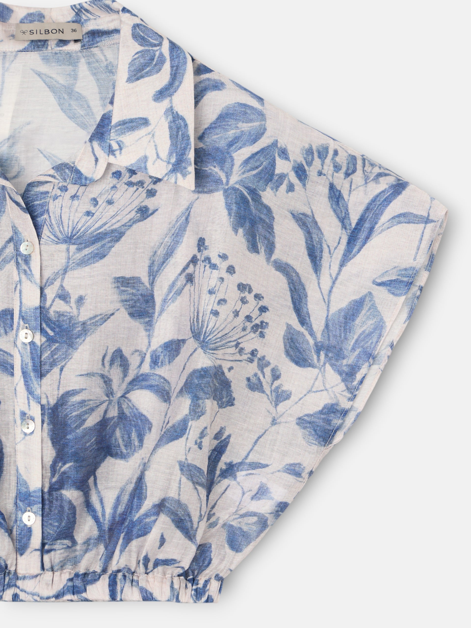 Short blouse with blue floral print