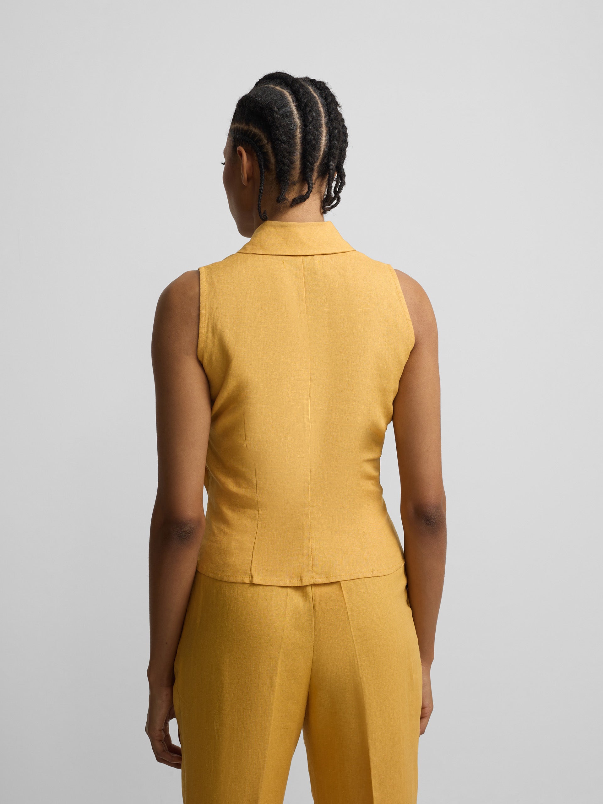 Top solapas lino amarillo