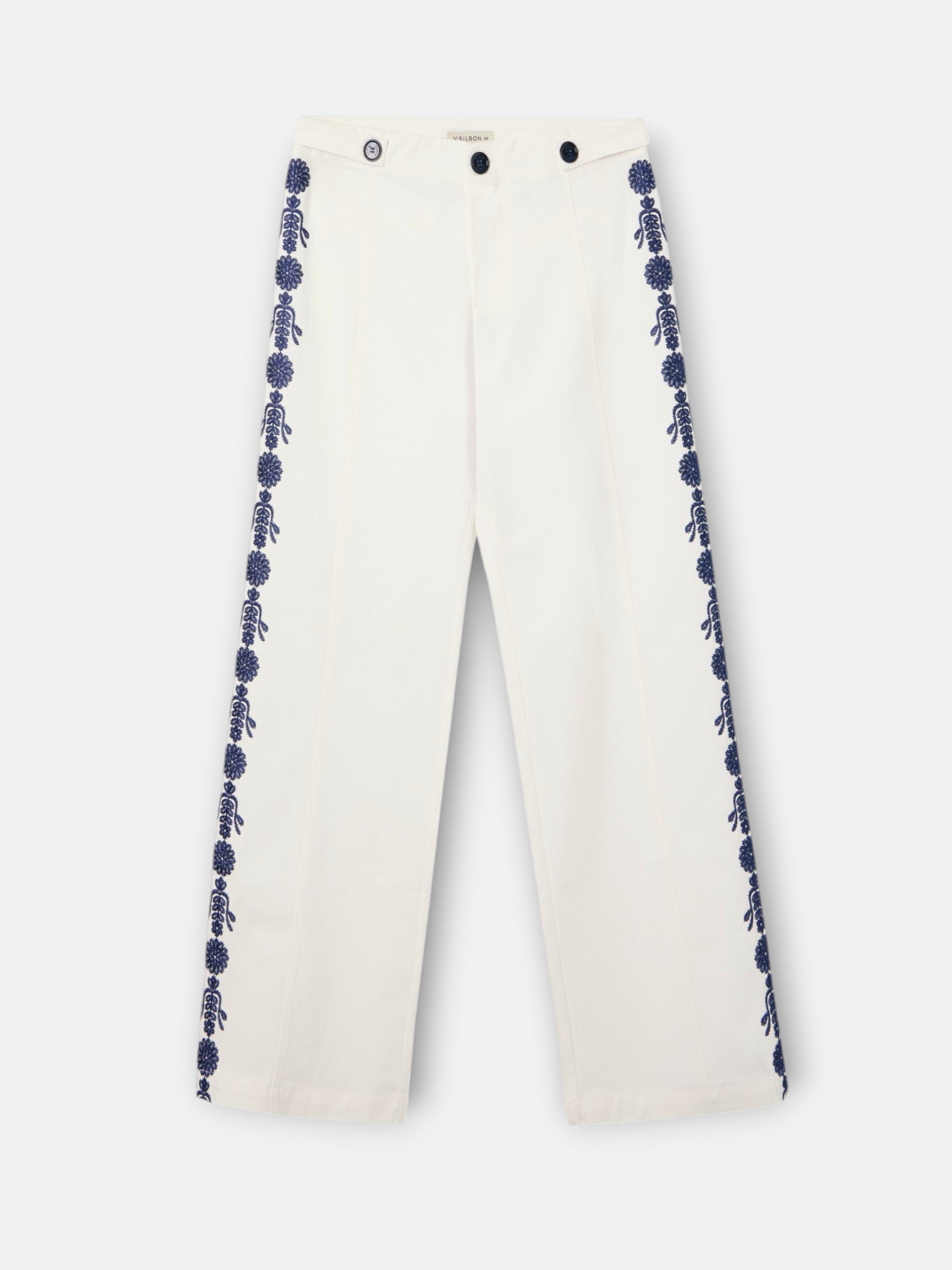 Straight pants with embroidered details in white