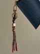 Golden and burgundy rope keychain