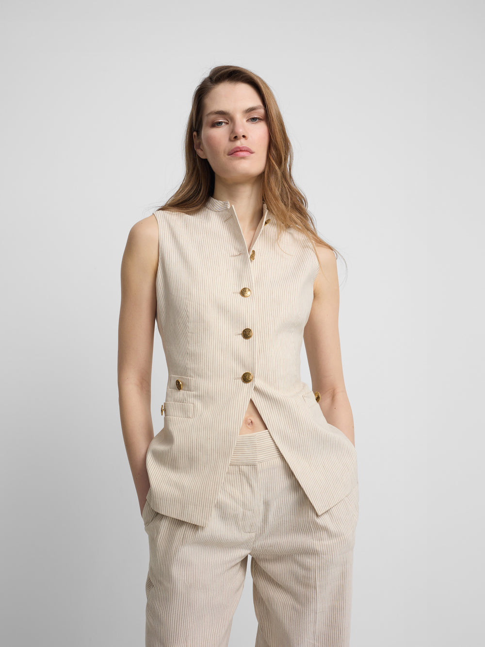 Chaleco botones rayas beige