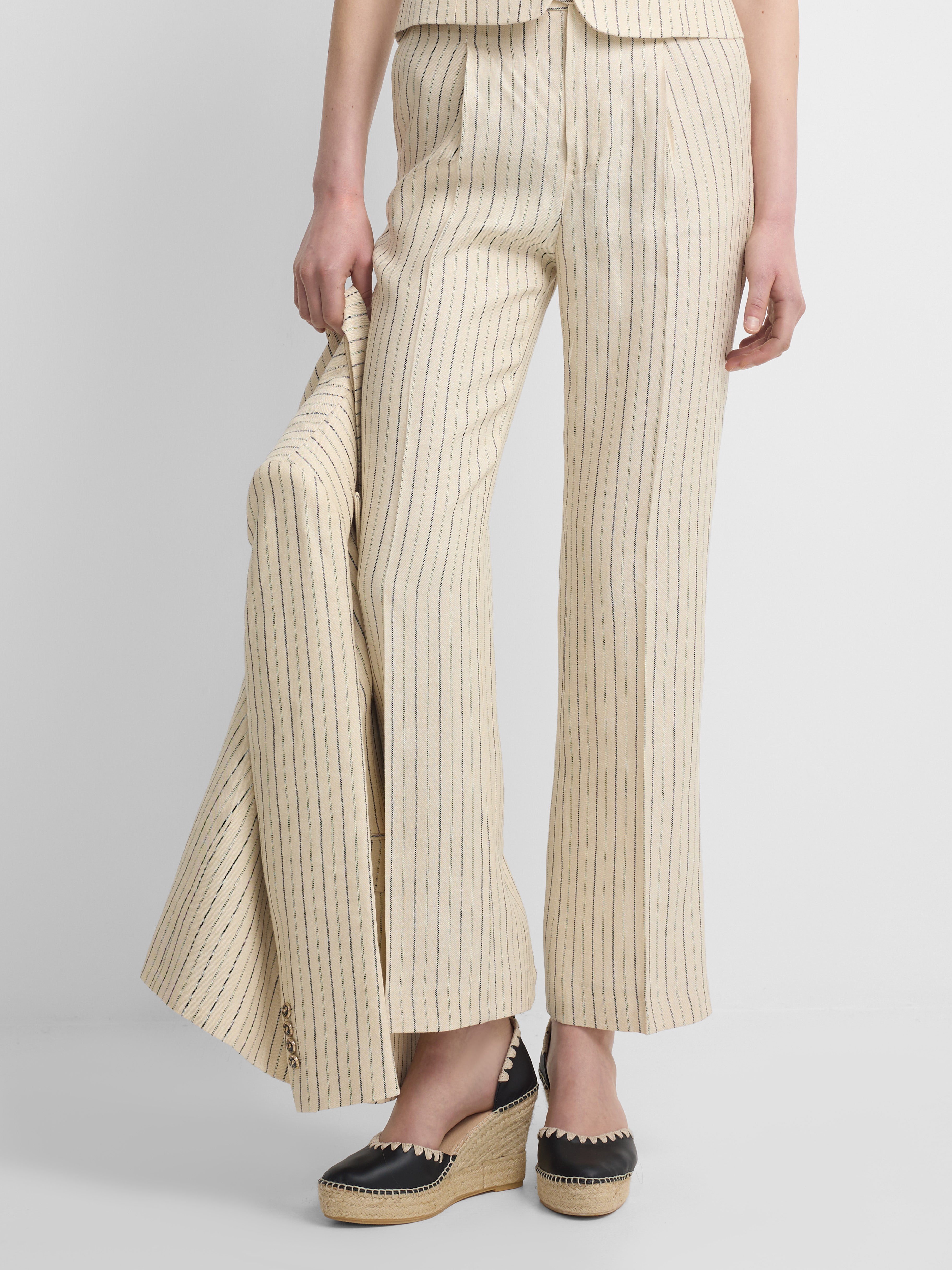 Pantalon crudo rayas azules