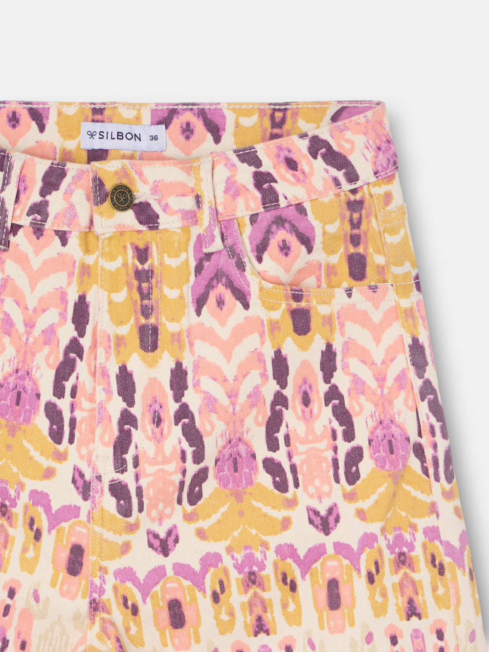 Ikat print denim trousers with roses