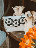 Bolso velada napa clutch crudo