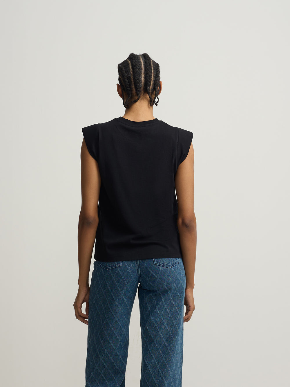 T-shirt femme noire avec épaulettes et application de cristal