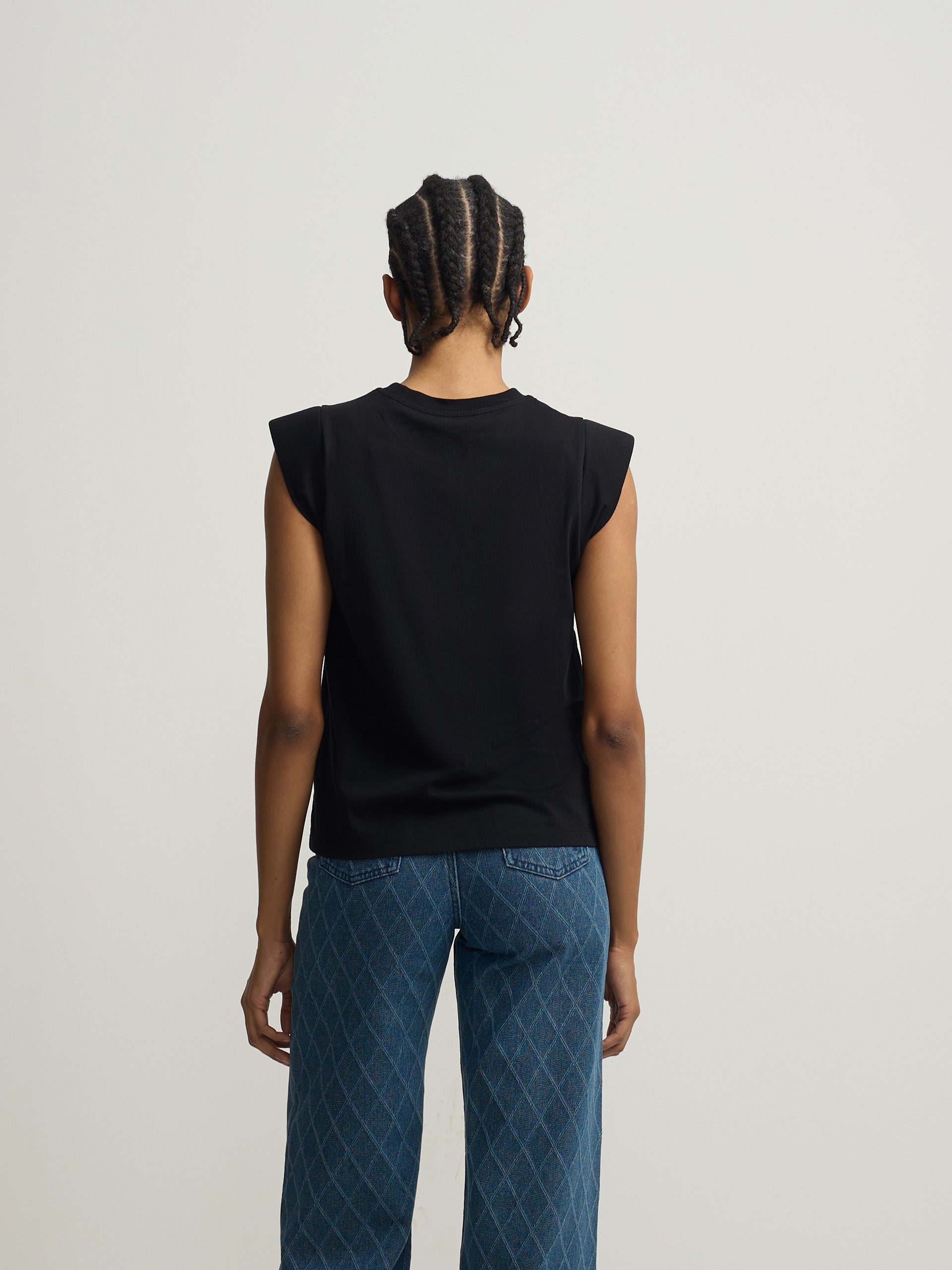T-shirt femme noire avec épaulettes et application de cristal
