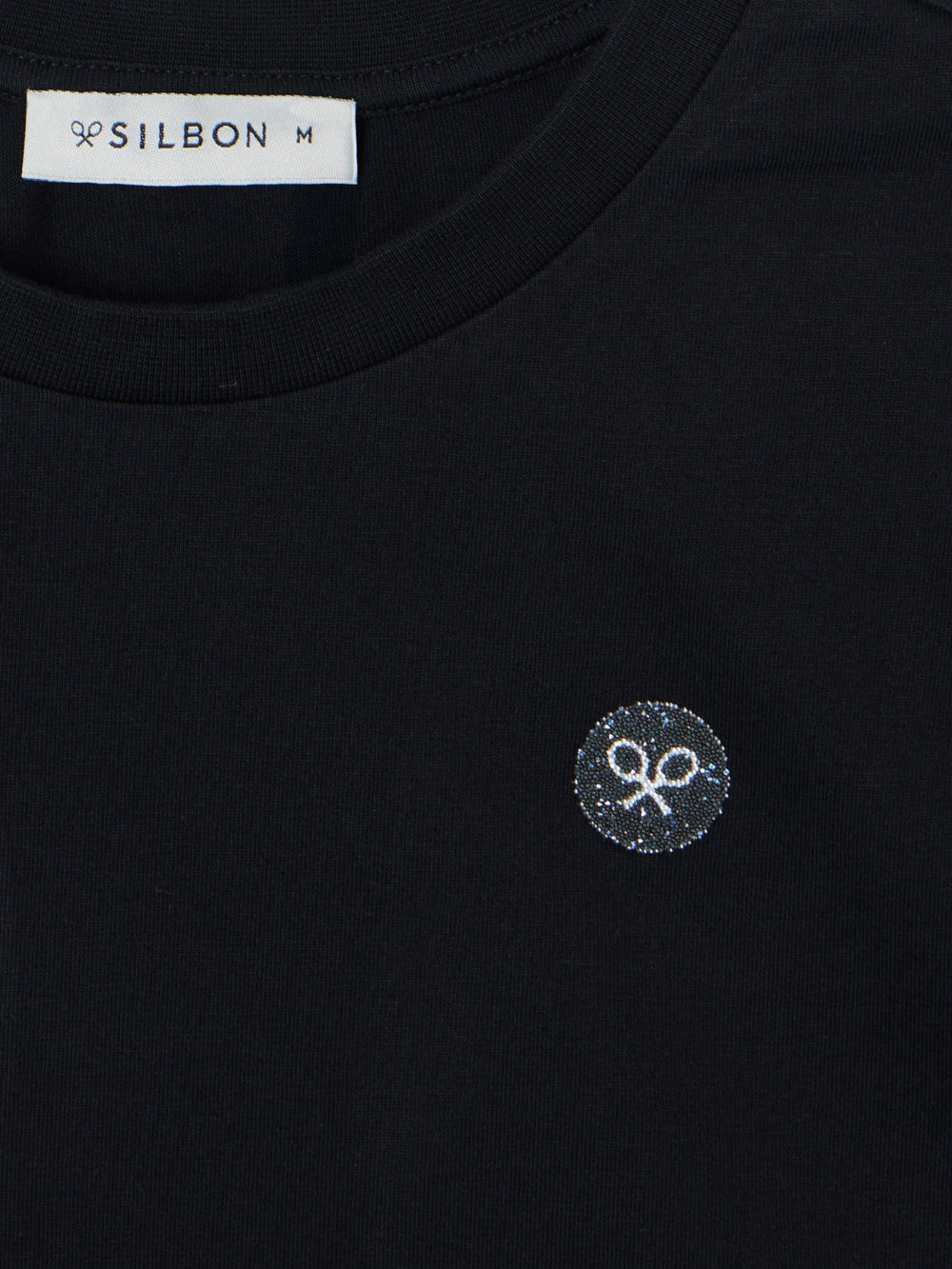 T-shirt femme noire avec épaulettes et application de cristal