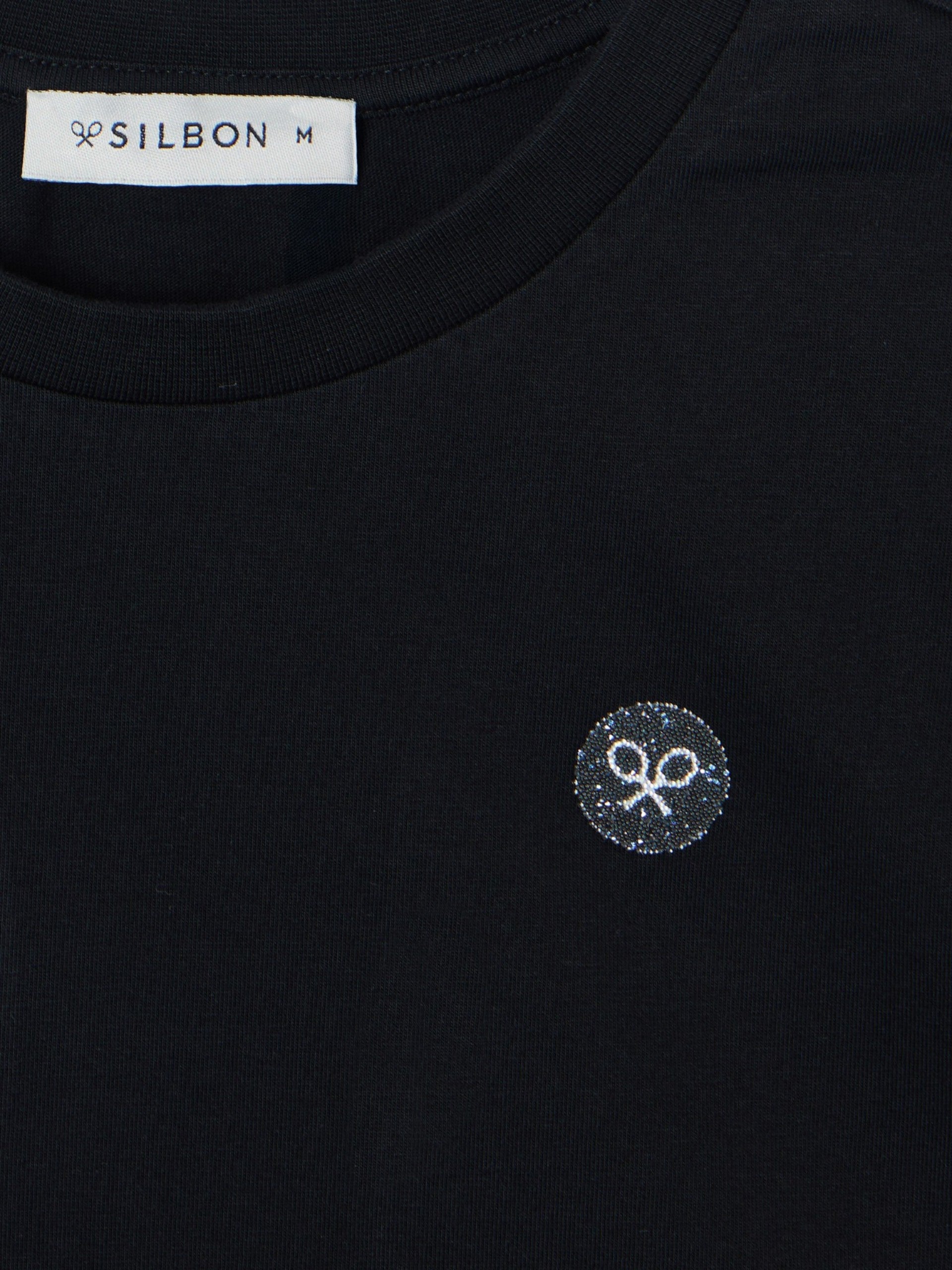 T-shirt femme noire avec épaulettes et application de cristal
