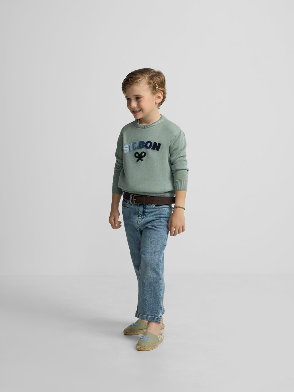 Kids sweater with colored letters in green