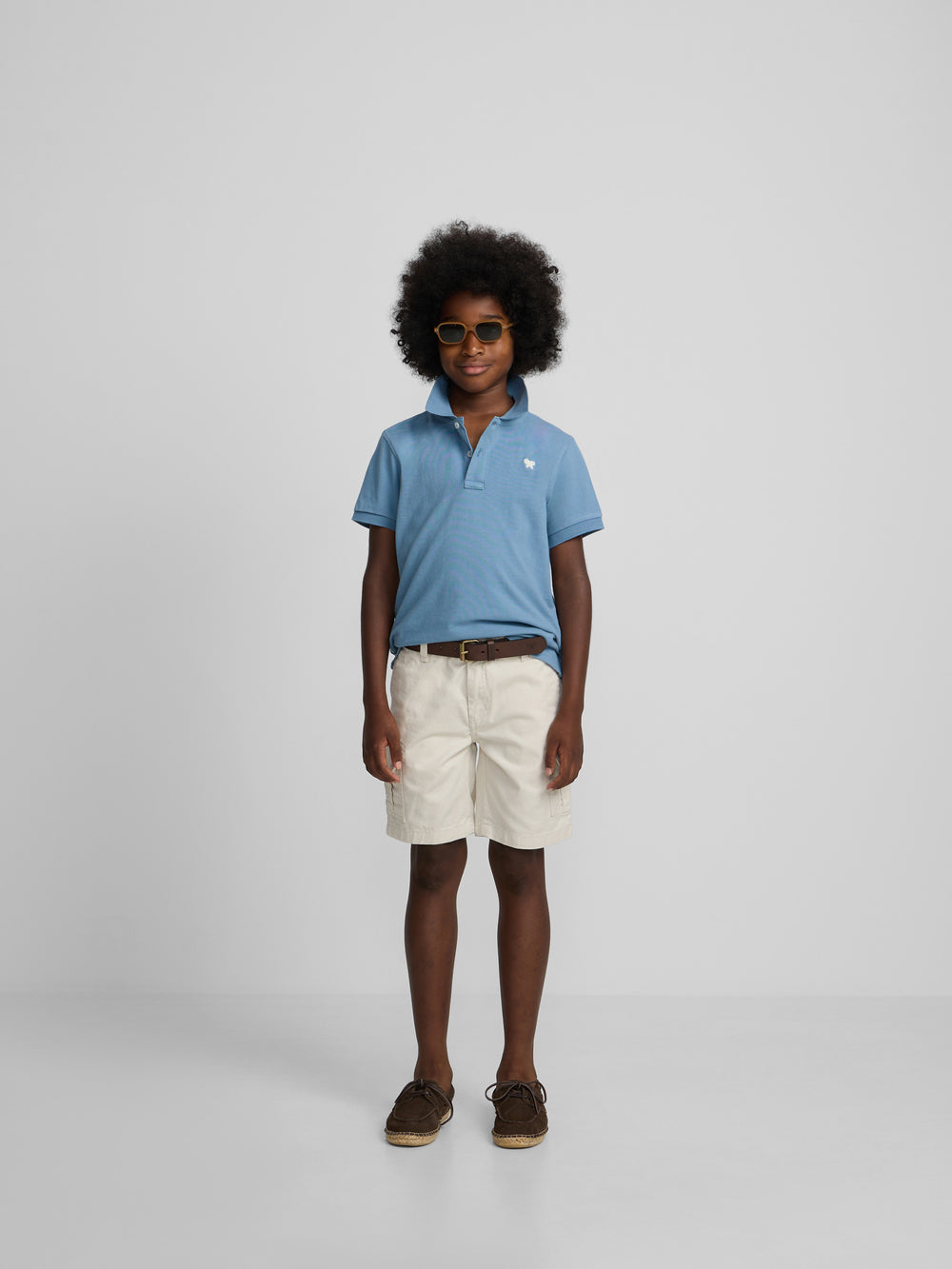 Plain kids polo with terry logo in medium blue