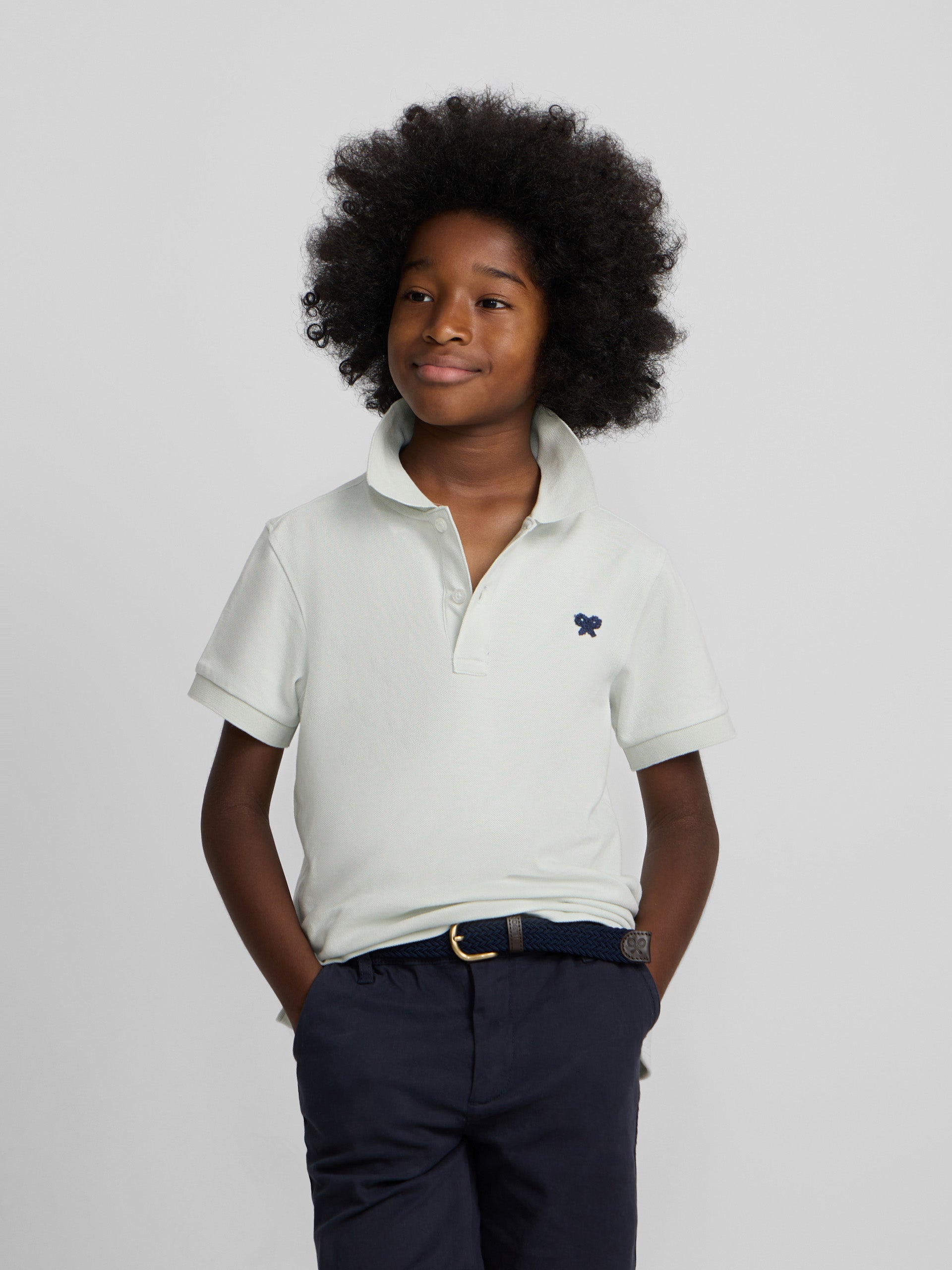 Polo kids liso logo rizo verde claro
