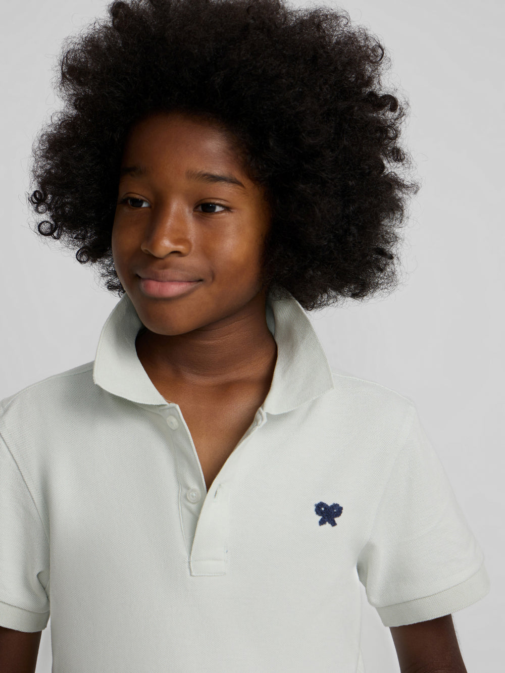 Polo kids liso logo rizo verde claro