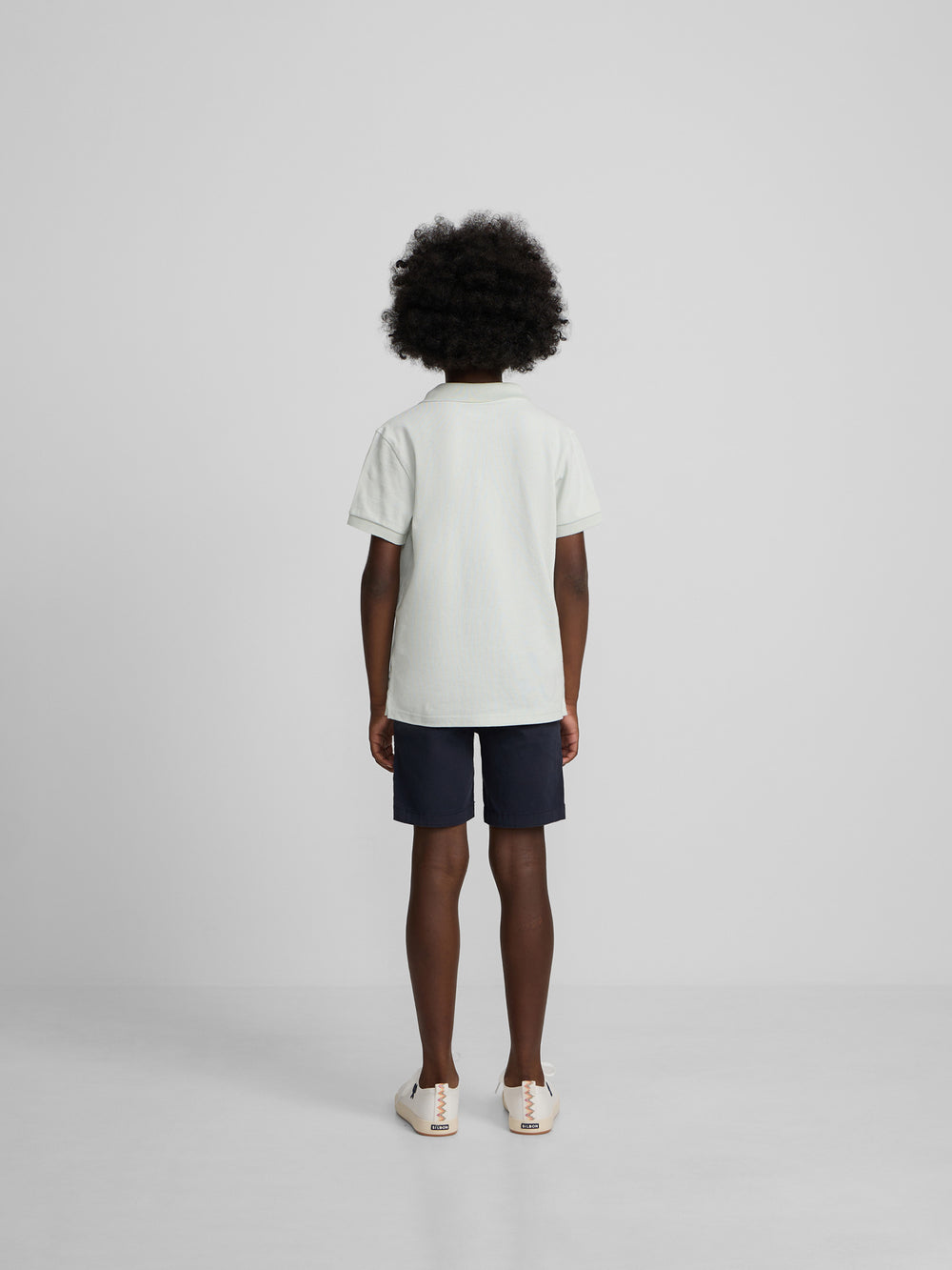 Polo kids liso logo rizo verde claro