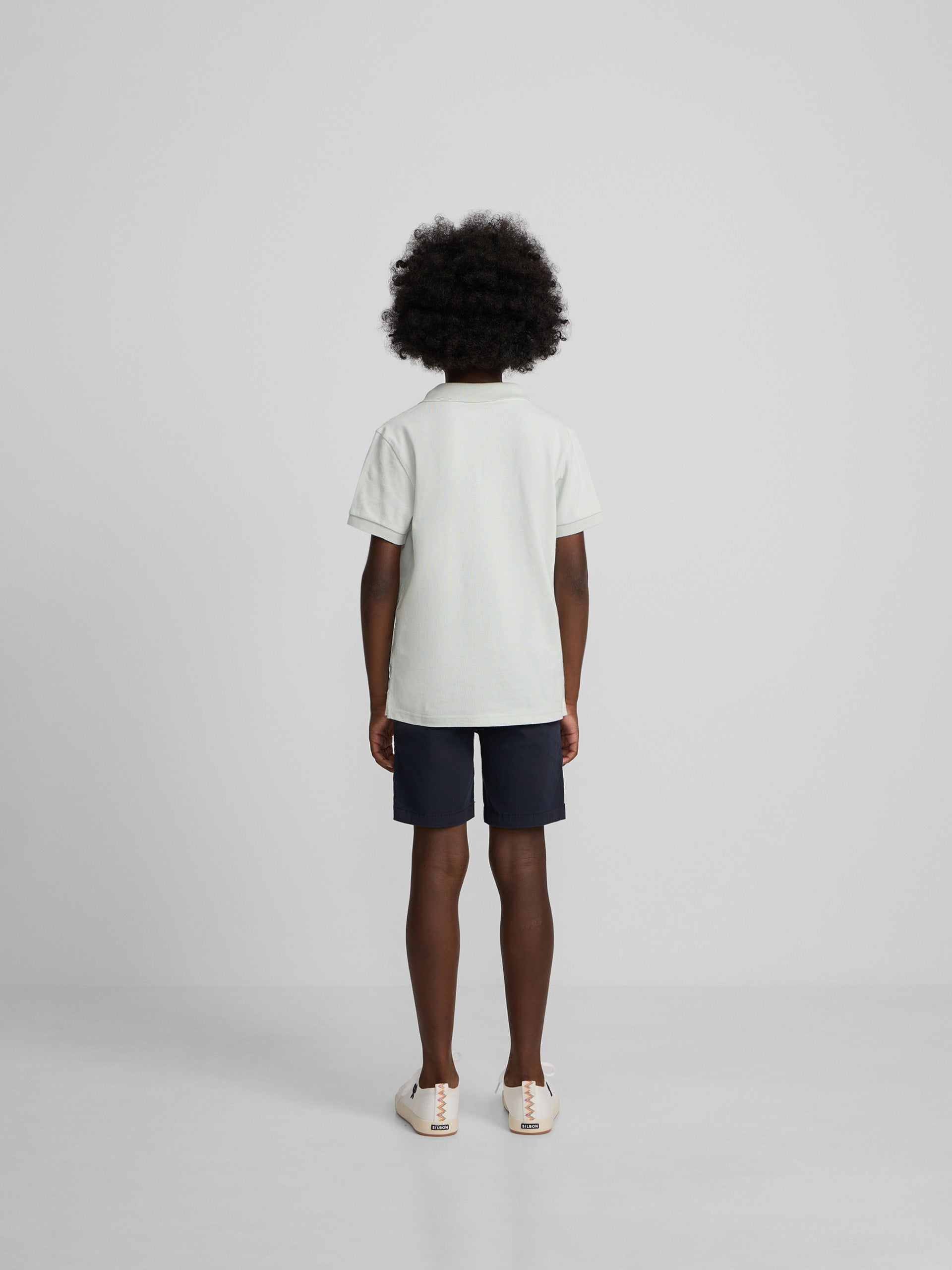 Polo kids liso logo rizo verde claro