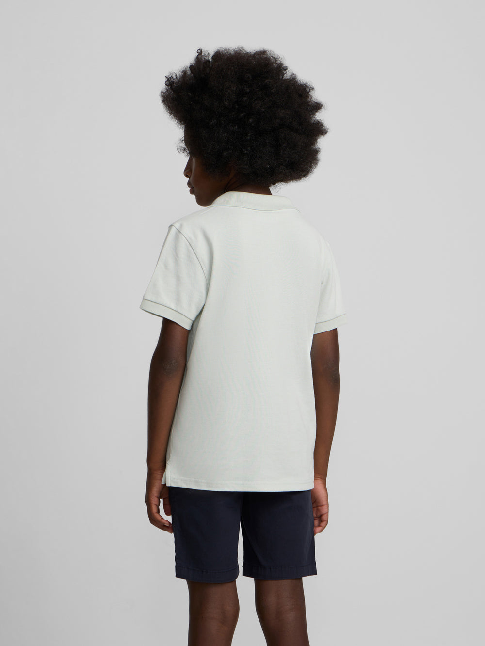 Polo kids liso logo rizo verde claro