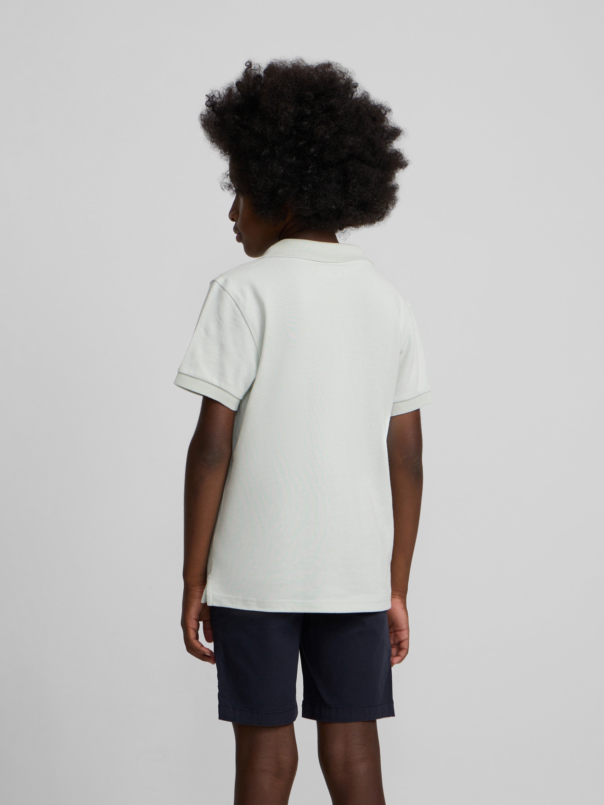 Polo kids liso logo rizo verde claro