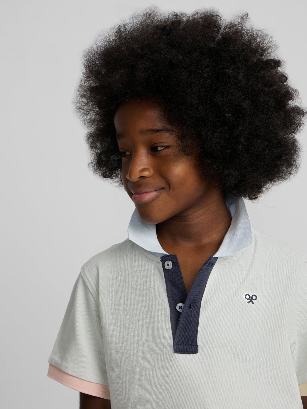Polo kids ribete multicolor verde claro