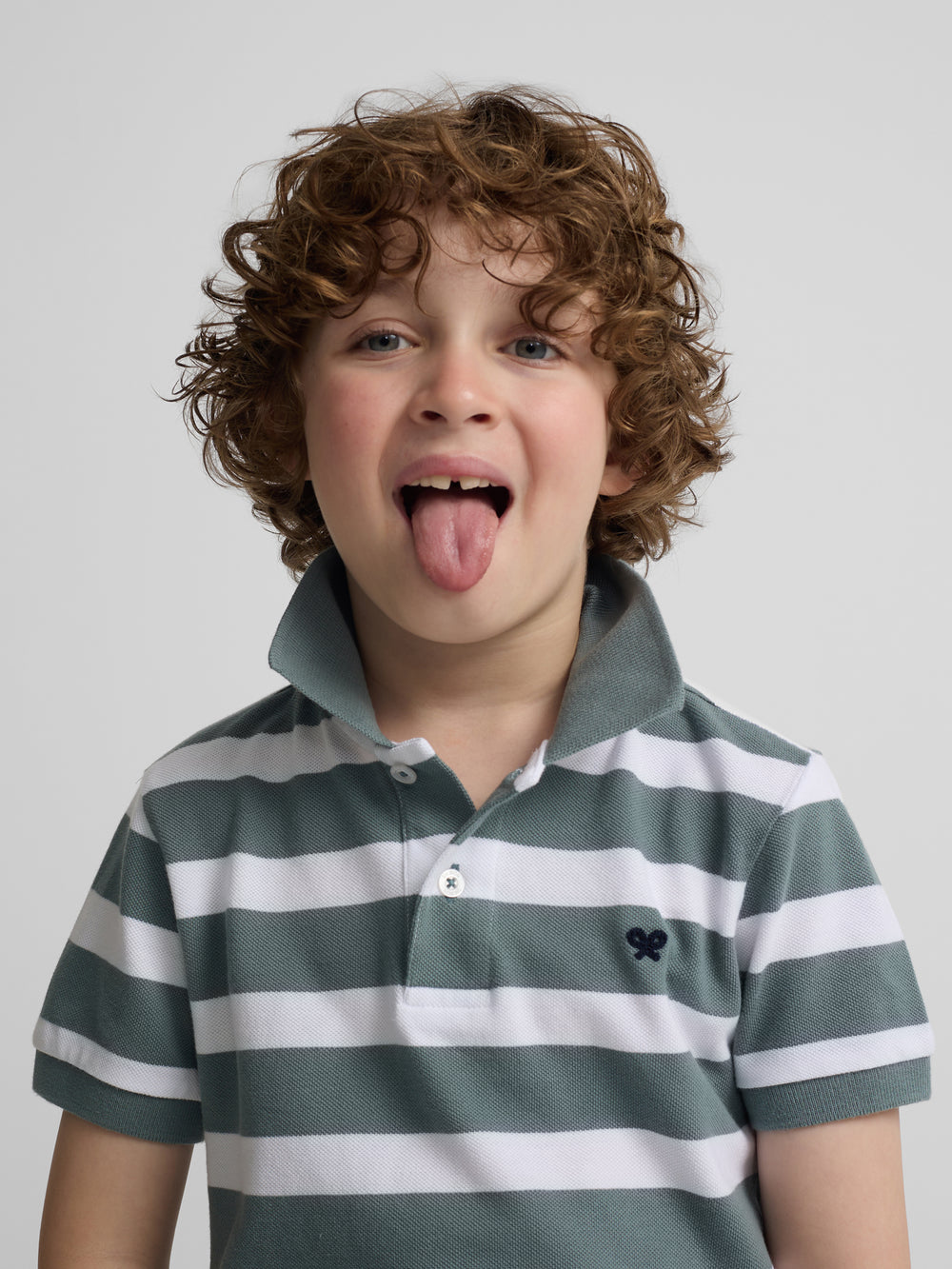 Polo enfant à rayures blanc et vert