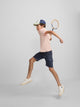 Polo enfant uni logo bouclé corail