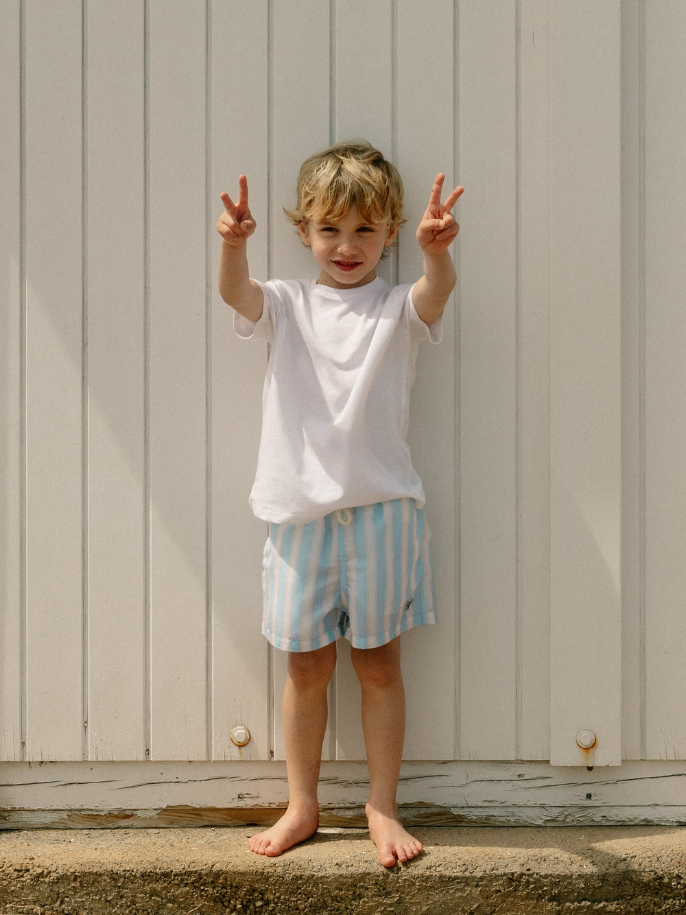 Maillot de bain enfant à larges rayures jaune et bleu