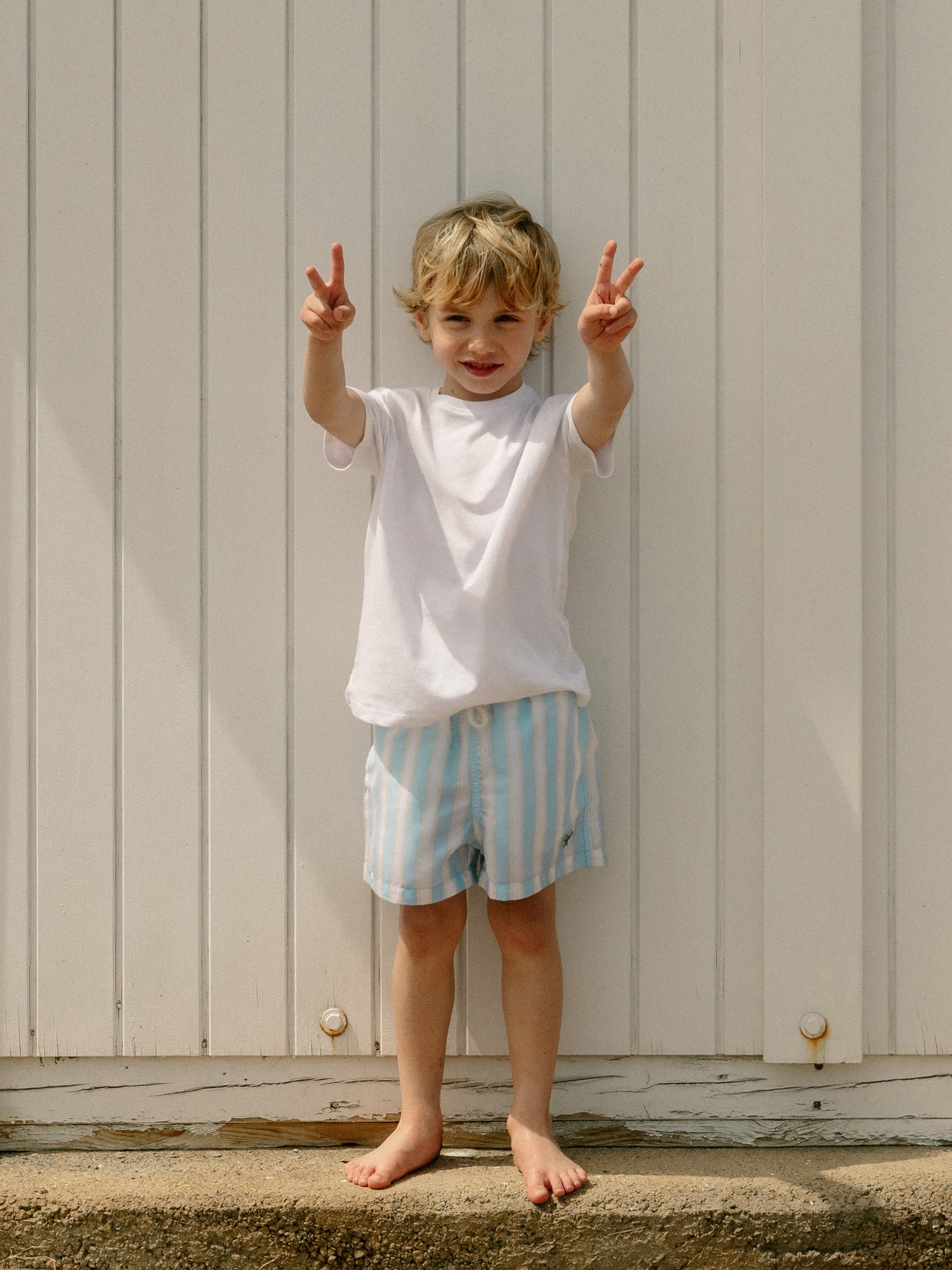Maillot de bain enfant à larges rayures jaune et bleu