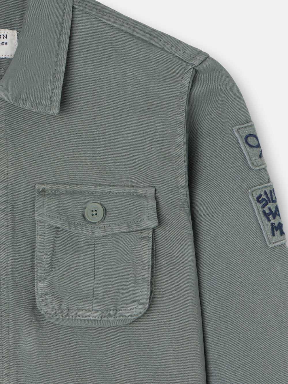 Chaqueta kids bolsillo parches verde