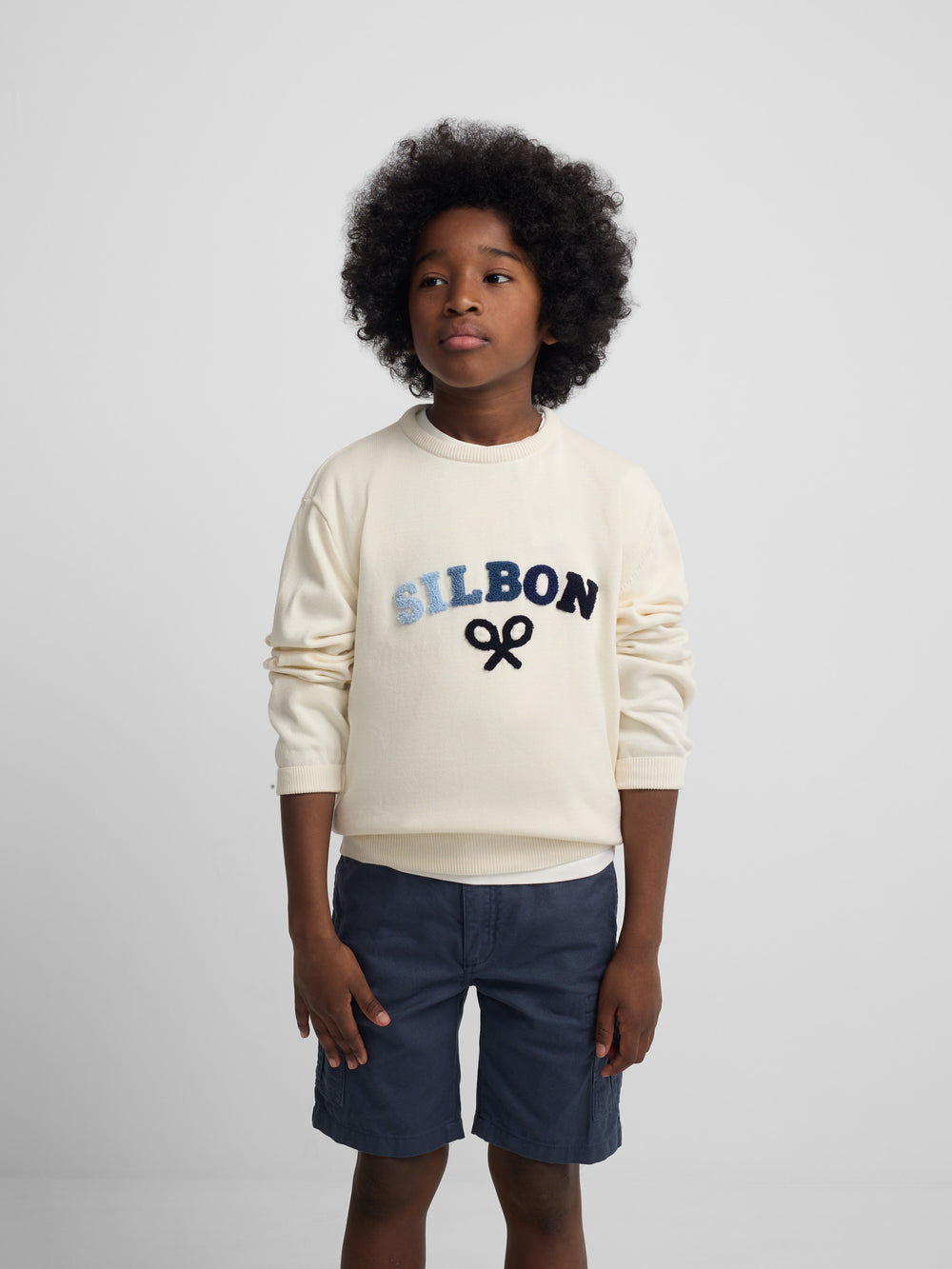 Kids' sweater with colored letters in cream
