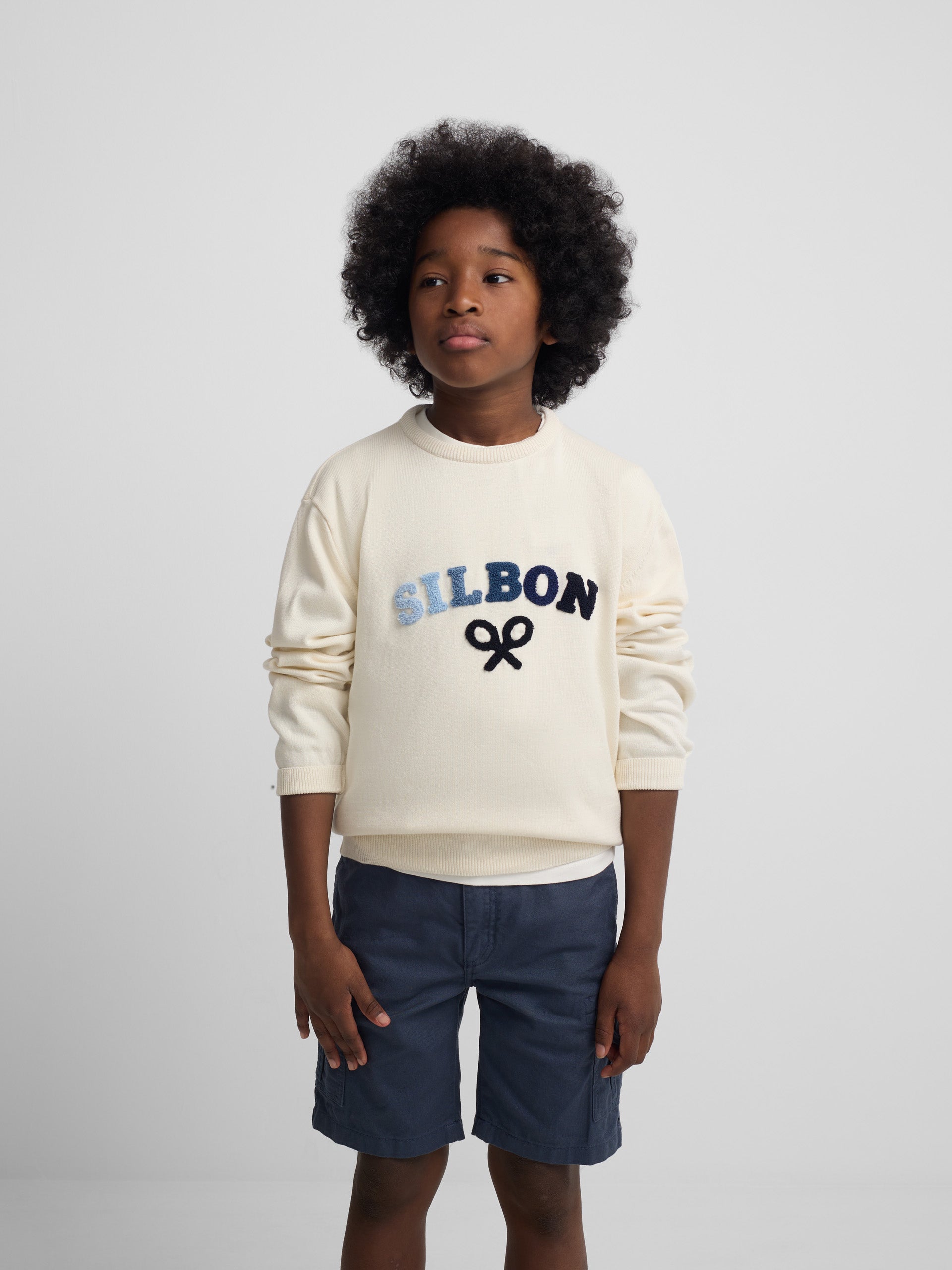 Kids' sweater with colored letters in cream