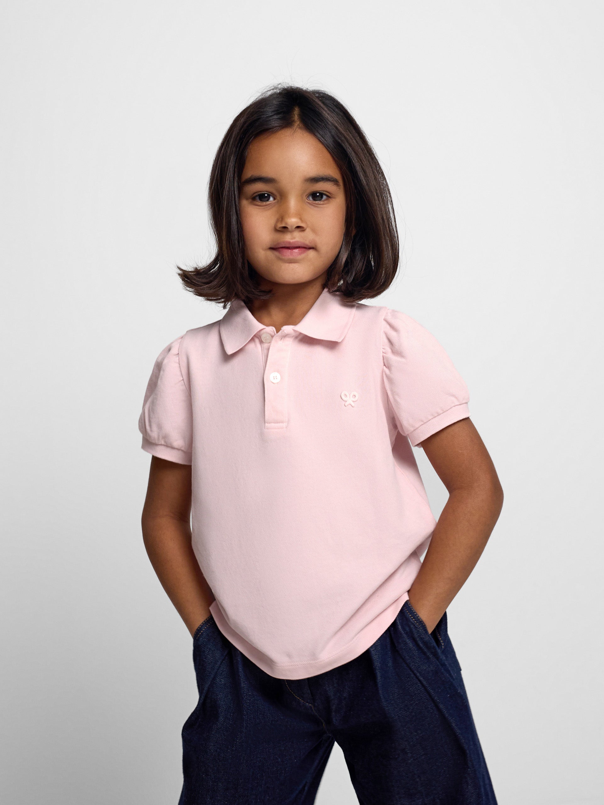 Polo de menina com manga bufante rosa claro