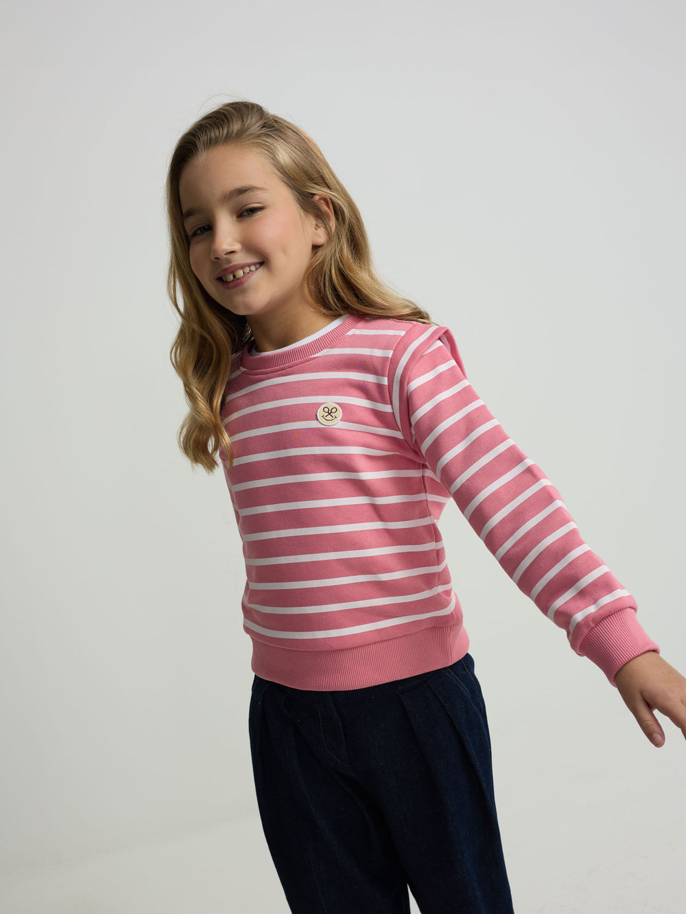 Girl's sweatshirt with pink striped shoulder pads