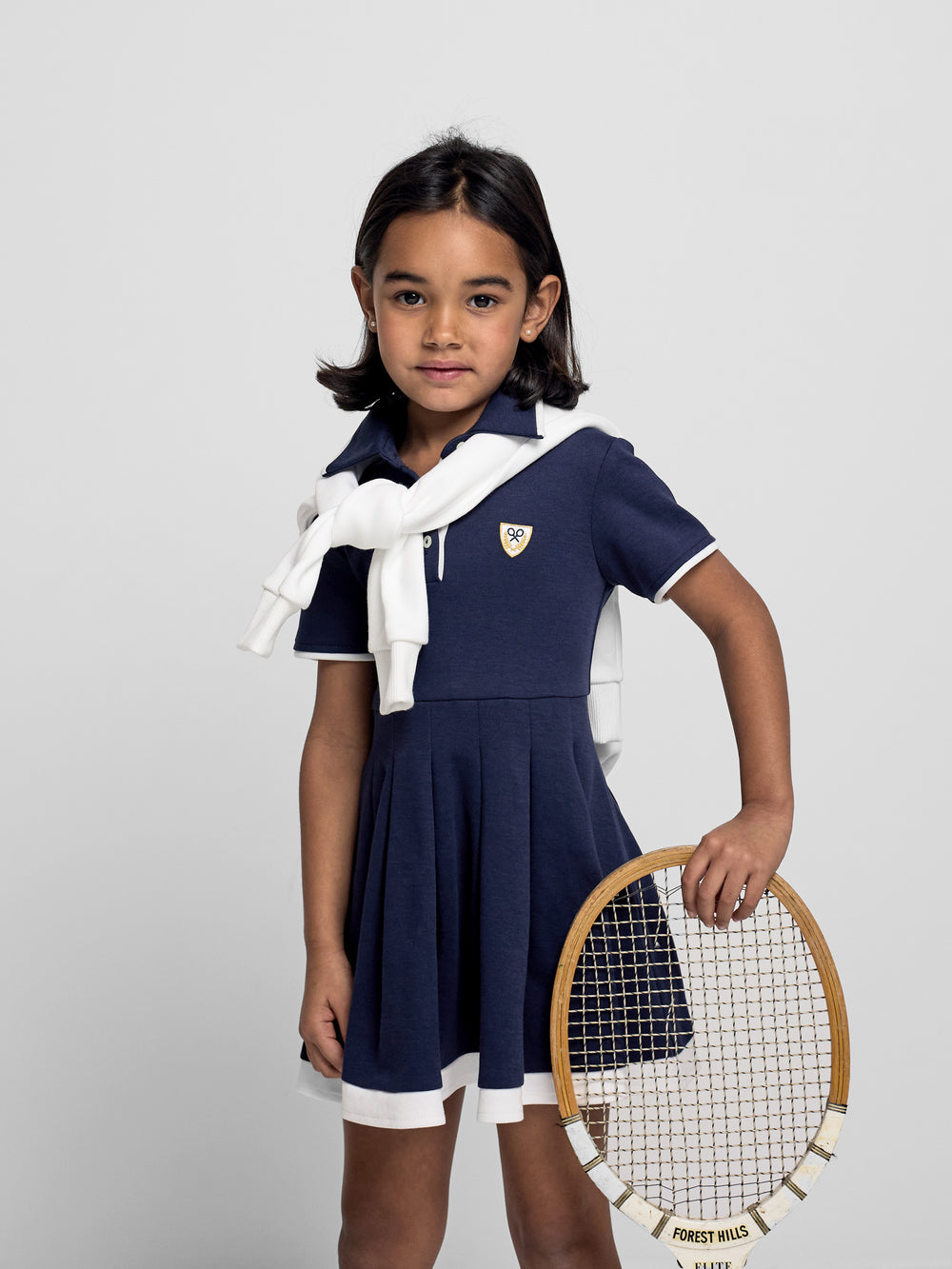 Vestido de menina em malha azul-marinho