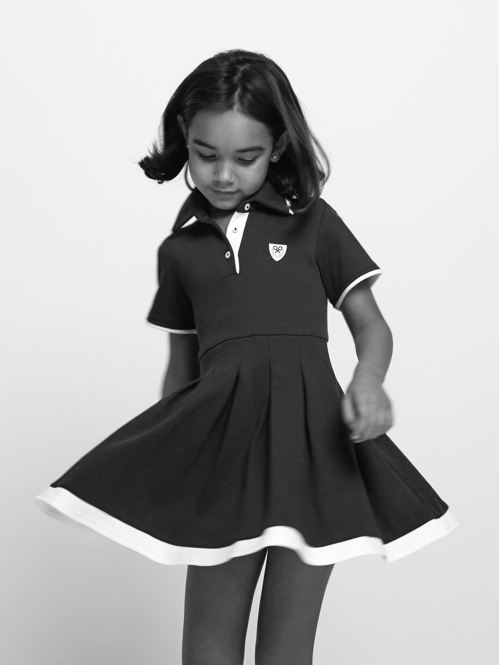 Vestido de menina em malha azul-marinho