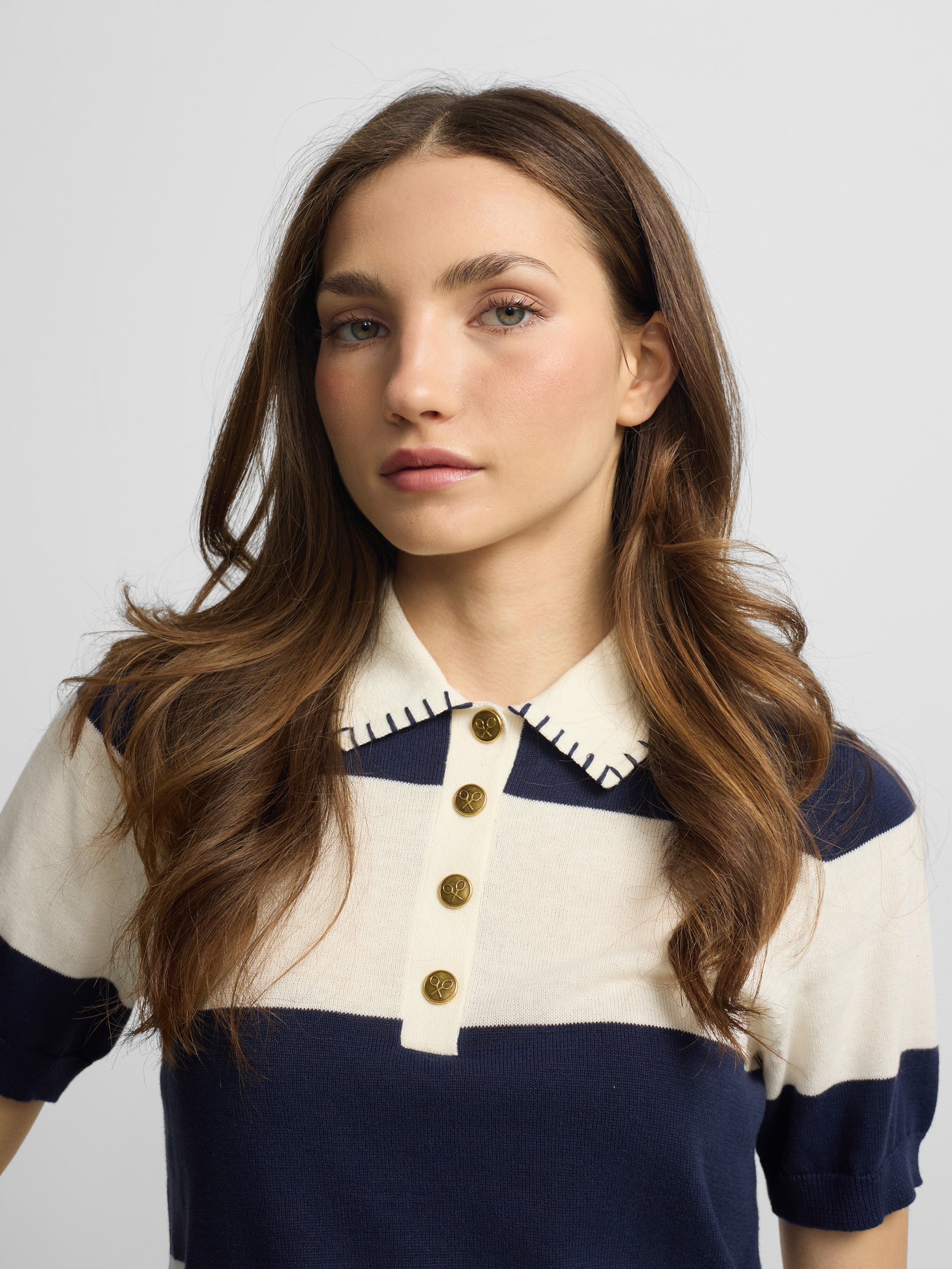 Blue and white short-sleeved knit polo
