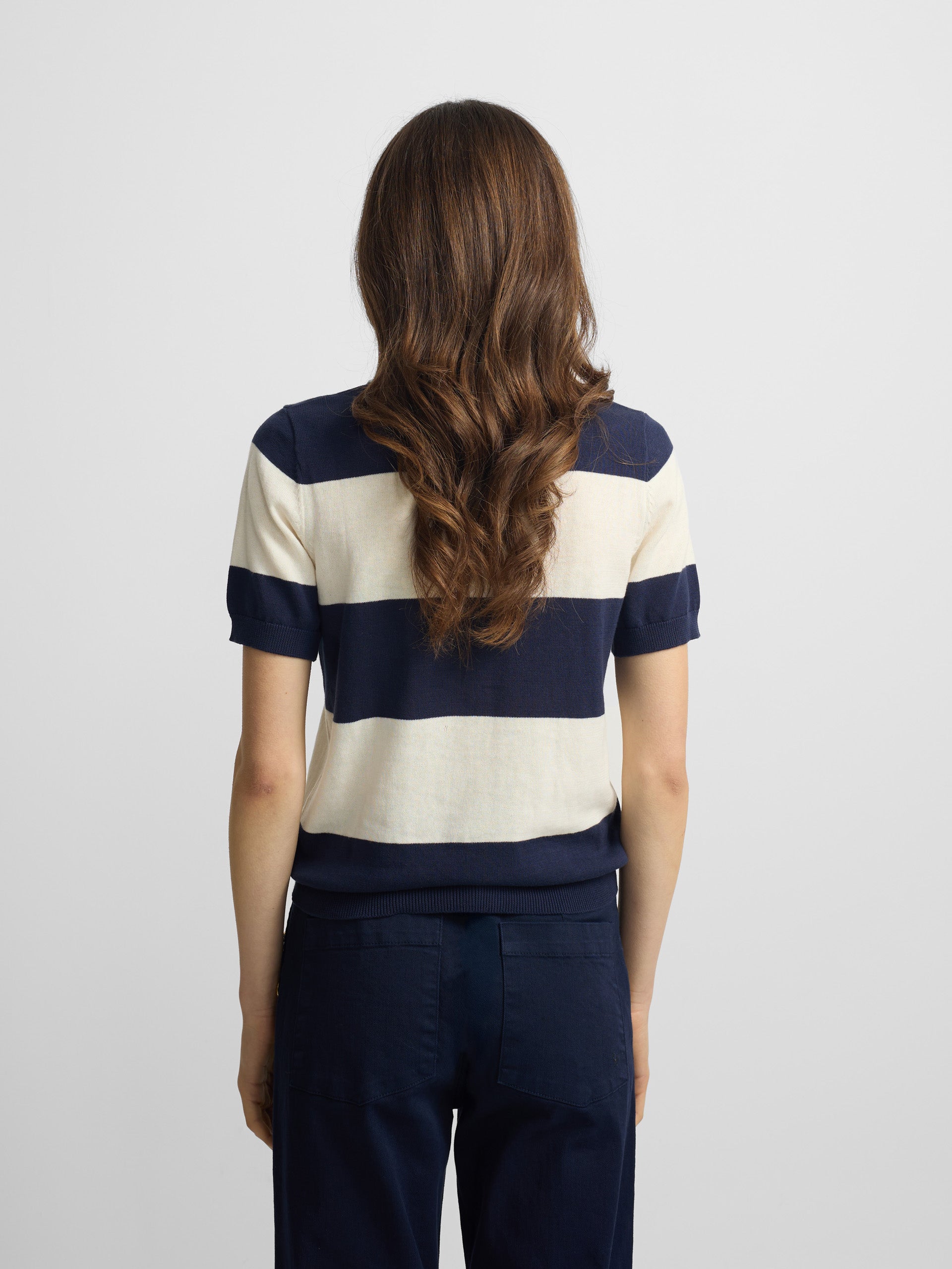 Blue and white short-sleeved knit polo